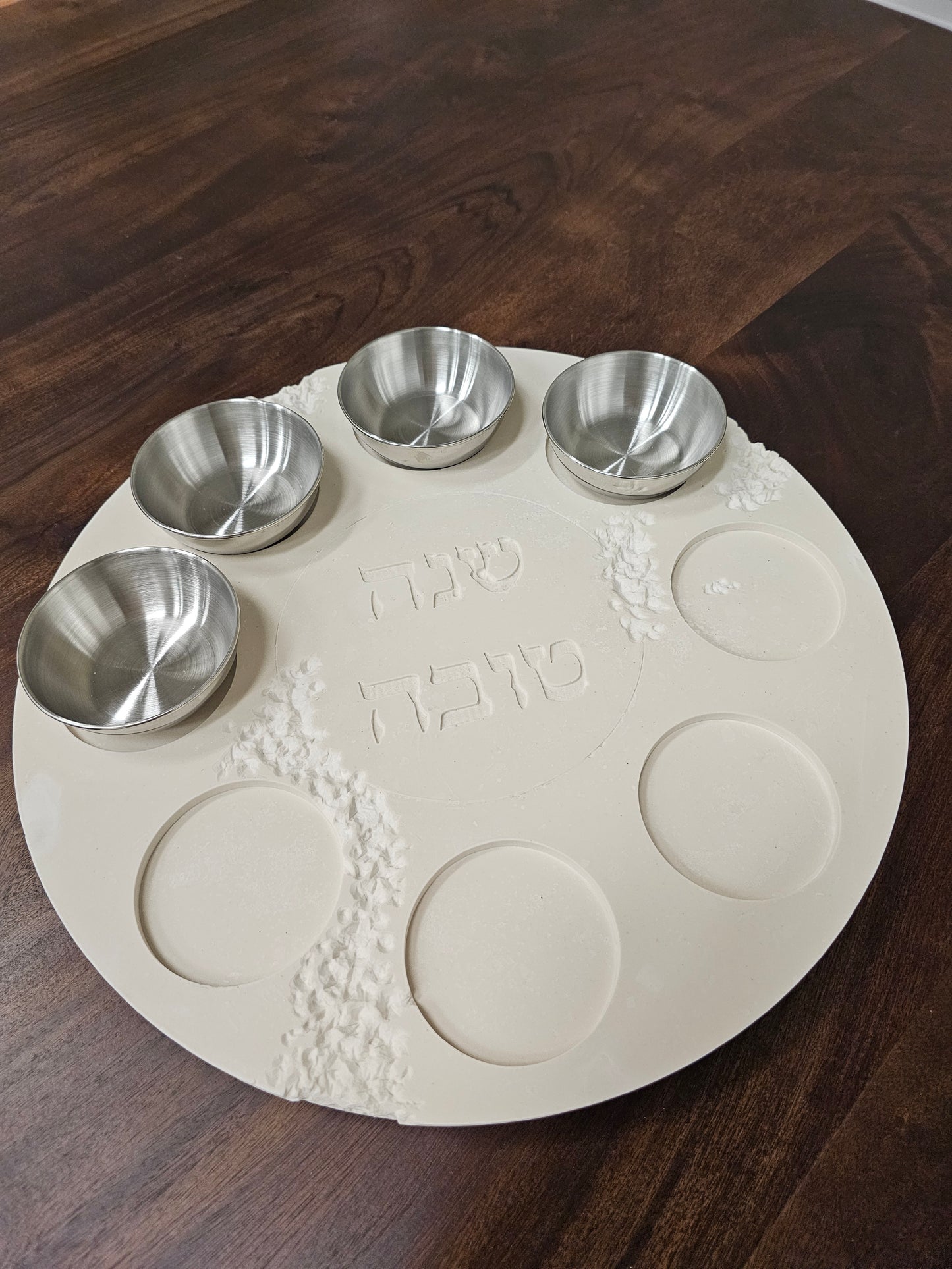 Modern terrazzo Rosh Hashanah serving plate with matching bowls for honey, apples, and simanim