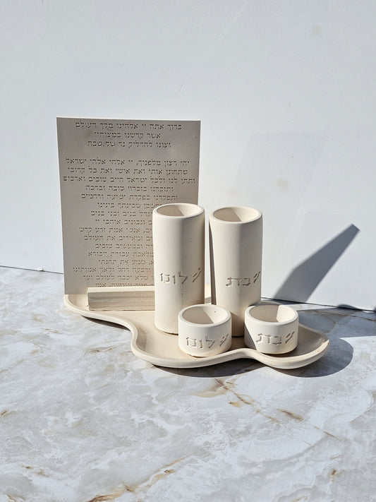 Elegant handmade Shabbat set in stone-look concrete with blessing plaque, vases, and tealight holders on sculpted tray